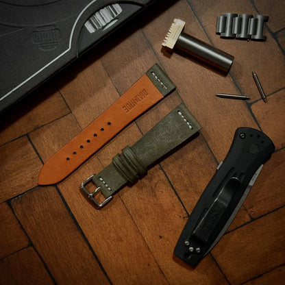 pueblo by badalassi Carlo grey watch strap with a watch coffee table book